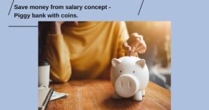 Save money from salary concept - Piggy bank with coins.